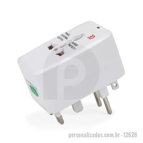 Adaptador de tomada universal personalizado - Descrição: Adaptador universal branco em plástico resistente.Possui plug EUROPE: para uso basta puxar a tomada cental, para guardar empurrar para dentro. Plug UK/SP: empurre o botão verde de lock para unlock e a tomada irá pra fora, para guardar basta empurrar a tomada de volta para dentro e empurre o botão para lock(neste processo é necessário segurar a tomada enquanto trava). Plug USA/JAPAN/AUST/THAI: empurre o botão verde de lock para unlock e a tomada irá pra fora, para guardar basta empurrar a tomada de volta para dentro e empurre o botão para lock(neste processo é necessário segurar a tomada enquanto trava). Parte central basta conectar algum dispositivo e utilizar as outras tomadas para conectar à energia. Quando o adaptador estiver com a luz vermelha acesa significa que está funcionando.  Medidas aproximadas para gravação (CxL):  4,3 cm x 2,3