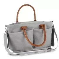 Bolsa Multifuncional em poliéster 300D com detalhes em PU e interior em 210D, possui 5 compartimentos externos. Conta com alças de ombro e mão em PU, engate para carrinho de bebê e velcro para fechamento interno. O interior oferece 5 divisórias remov