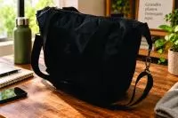 Bolsa prática e durável para trabalho e viagens: protege o notebook, oferece organização interna e versatilidade de transporte (mão, ombro ou sobre a mala).