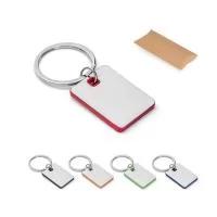 Chaveiro em metal e ABS. Fornecido em bolsa presente de papel kraft. 29 x 40 x 4 mm
