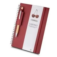 "Caderno de anotações 21x15cm, capa em papel 100% reciclado com elástico, contendo: Miolo de 70 folhas pautadas na cor bege