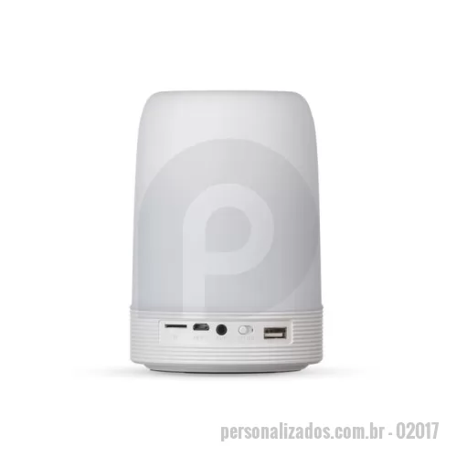 Caixa de som personalizada - Caixa de som multimídia com luzes, suporte para celular e porta caneta. Material plástico resistente na cor branca fosca, parte superior com falante vazado na área interna, pode ser utilizado como porta caneta ou suporte para celular. Parte inferior branca leitosa com linhas em relevo, borracha infe