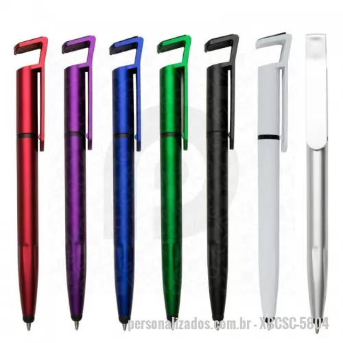 Caneta plástica personalizada - Caneta plástica touch com suporte para celular, caneta inteira colorida com detalhes preto e parte superior com limpador de tela, possui anel preto abaixo do clip e parte inferior com detalhes em relevo, aciona por giro . Largura: 1,9 cm MEDIDA: 4X1 cm. GRAVAÇÃO: Tampografia 1 cor. peso aproximado 10 (g).