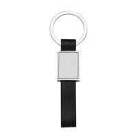 Chaveiro de metal quadrado com alça emborrachada. Possui chapa frontal em metal e verso liso.