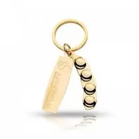 Chaveiro em metal, desenvolvido para a Aprosoja, chapa em corrosão com gravação de logo em baixo relevo, Soja modelada 3D, banhado a ouro, sistema  argola.