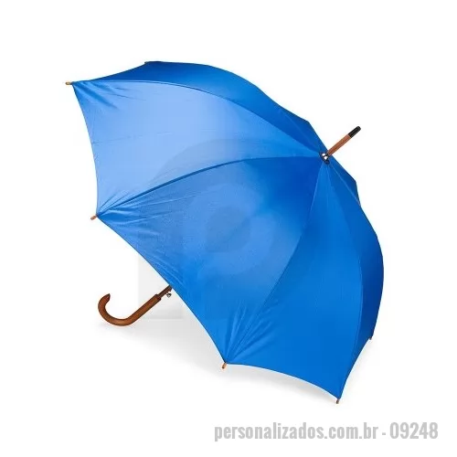 Guarda chuva personalizada - Guarda-chuva em poliéster com abertura automática por botão metálico. Possui estrutura com haste e pegador em madeira de bétula, oito varetas metálicas e faixa para fechamento em velcro.  Altura: 89 cm Largura: 12,1 cm Medidas aproximadas para gravação: (CxL): 30 cm x 12 cm (cada painel)