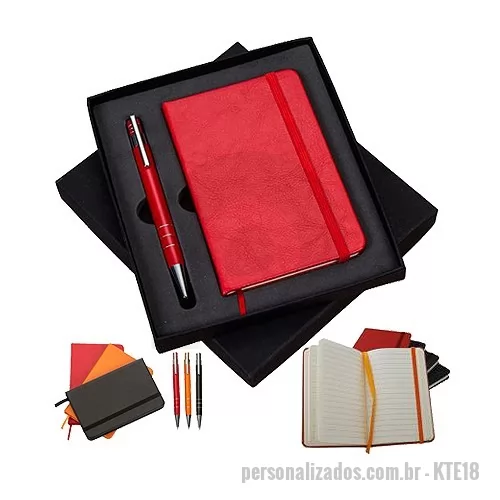 Kit escritório personalizado - Conjunto caneta e caderneta tipo moleskine, embalagem de papelão revestido com espuma internamente. Caneta semi-metal colorida com detalhes prata, possui 3 anéis superiores e inferiores, clip de metal e aciona por clique. Caderneta couro sintético co