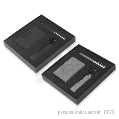 Kit executivo personalizado - Kit executivo Personalizado - 15173 - Nosso kit executivo traz praticidade e elegância para o dia a dia. Produzido com metal e tecido em rPET reciclado, ele conta com um porta-cartão com chapa metálica para gravação e um interior revestido em veludo, garantindo sofisticação. A caneta esferográfica azul, com acionamento por rotação, é ideal para anotações rápidas, e o chaveiro é a solução perfeita para manter suas chaves sempre organizadas. Todos esses itens são acomodados em um estojo de papelão com abertura pela lateral, perfeito para presentear ou guardá-los com cuidado.   Altura: 18,5 cm Largura: 17 cm Espessura: 2,7 cm - 180009 - Kit executivo