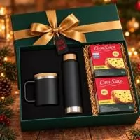 O kit contém:  1 copo de viagem em aço inox 90% reciclado,térmico com parede dupla isolada a vácuo e tampa em bambu 420 ml  1 garrafa em aço inox de parede dupla térmica,isolada a vácuo 640 ml  2 mini panetone. casa suíça frutas 80g  1 caixa cartonada 34x25x8cm com tampa  Esteira de papelão