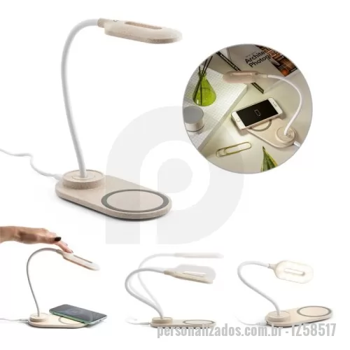 Luminária com cabo USB personalizada - Luminária de mesa em fibra de palha de trigo e ABS com carregador por indução (wireless) super-rápido. A haste é flexível para ajustar a direção da luz e contém 20 LEDs que permitem uma iluminação até 3 níveis de intensidade. No topo da luminária encontra-se um botão touch para ligar, desligar e ajustar os níveis de iluminação. O carregador sem fios é de carregamento super-rápido, tendo uma potência até 15W. No local onde o equipamento é colocado tem um círculo com silicone para evitar que se mova. Incluso cabo USB-C de 1 m. Fornecido em caixa presente de papel kraft reciclado. A cor e o resultado da impressão nos materiais naturais pode variar entre produtos. 160 x 268 x 85 mm