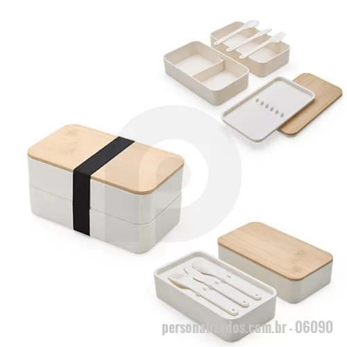 Marmita personalizada - Marmita dupla em fibra de trigo livre de BPA, sendo um compartimento de 600ml com tampa de bambu e outro compartimento de 500ml com suporte para talheres de fibra de trigo. Possui uma divisória removível e elástico para um transporte seguro. Acompanha garfo, faca e colher. Obs: O tempo de aquecimento no micro-ondas não deve ultrapassar 3 minutos.