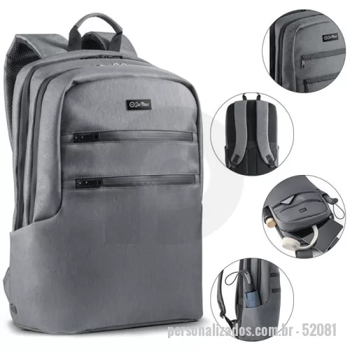 Mochila para notebook personalizada - Mochila para notebook em Nylon 2Tone impermeável, perfeita para quem busca praticidade e segurança. Com 2 compartimentos principais, sendo um posterior com 2 divisórias almofadadas e fecho em velcro para notebooks de até 17'' e tablets de até 10.5'', oferece proteção e organização. O compartimento frontal conta com diversos bolsos para pequenos itens, além de 2 bolsos externos, sendo um com bloqueio RFID para maior segurança. Nas laterais, há espaço para garrafa e guarda-chuva, com ilhós para drenagem de água. A parte de trás, almofadada, possui bolso oculto e banda para transporte em trolley, garantindo conforto e praticidade no dia a dia.