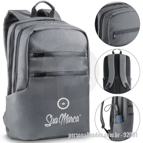 Mochila para notebook personalizada - A mochila para notebook personalizada em Nylon 2Tone é a escolha perfeita para quem busca praticidade e proteção! Com design impermeável, oferece dois compartimentos bem organizados: o posterior com divisórias almofadadas para seu notebook de até 15'' e tablet de até 10.5'', e o frontal com múltiplos bolsos internos para facilitar o armazenamento. Ela conta ainda com dois bolsos frontais, sendo um com bloqueio RFID para proteger suas informações. Nas laterais, há espaço para garrafas e guarda-chuva, com design inteligente para evitar acúmulo de água. O conforto fica por conta das alças almofadadas e da parte traseira que tem um bolso oculto e uma banda para transporte em trolley. Com capacidade para até 14L, é a mochila ideal para o seu dia a dia.
