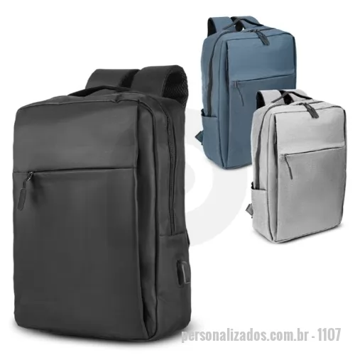 Mochila para notebook personalizada - Mochila para notebook em tecido poliéster 600D e interior em 210D. Parte externa: 2 Bolsos frontais com ziper; 1 Bolso lateral; Alça de mão e ombro acolchoadas; Conector USB externo na lateral; Engate para mala de viagem.  Parte interna: Compartimento acolchoado para notebook de 39x27cm; Tamanho total do Notebook - 15,6¨ 2 Porta Objetos; 2 Porta Canetas.