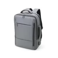 Mochila em couro sintético 23 litros resistente à água com quatro compartimentos, sendo o principal com bolso para notebook 15,6 e tablet 10. Com divisórias internas para acessórios, a mochila possui suporte externo usb, alça para encaixe em malas de viagem e duas alças de mãos, sendo uma delas lateral para o transporte da mochila no modo pasta.