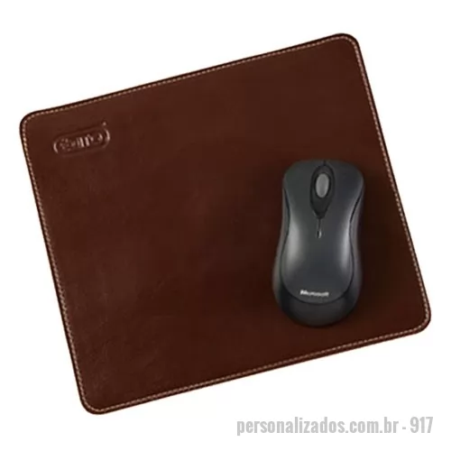 Mouse pad personalizado - Mouse pad retangular, podendo ser confeccionado em Couro Natural ou Material Sintético, totalmente pespontado, contendo base em EVA. Medidas: 26x23 cms.