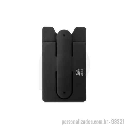 Porta cartões para smartphone personalizada - VERIFICAR DISPONIBILIDADE DE COR  Porta cartões para celular em silicone com autocolante no verso e suporte para smartphone. 57 x 96 x 5 mm     Apresentamos o nosso prático porta cartão personalizado para celular, ideal para brindes corporativos! Esse acessório inteligente permite que seus clientes e parceiros de negócios organizem seus cartões essenciais de forma conveniente e tenham acesso rápido a eles, tudo enquanto mantêm seus smartphones por perto.  Nosso porta cartão é projetado para aderir perfeitamente à parte de trás do celular, ocupando pouco espaço e oferecendo praticidade extra. Com compartimentos de armazenamento seguros, é possível guardar cartões de crédito, cartões de visita e até mesmo algum dinheiro, sem a necessidade de carregar uma carteira volumosa.  Além da funcionalidade, oferecemos opções de personalização para adicionar o logotipo da sua empresa, mensagens motivacionais ou qualquer outro elemento visual que represente a sua marca. Com uma ampla variedade de co