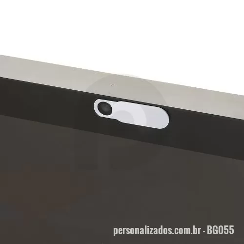 protetor de webcam personalizado - Detalhes:  Proteção que bloqueia a visão da câmera de notebooks, quando desejado. Ela é feita em PP rígido e está disponível em duas cores: preta e branca.