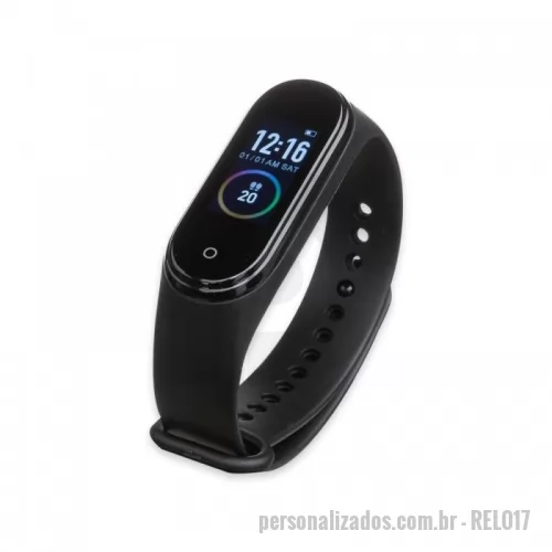 Relógio personalizado - Pulseira inteligente M4. O smartwatch é um relógio fit impermeável com sensor que monitora suas atividades do dia a dia para o controle de sua saúde, tem funções como: pedômetro, contador de quilometragem, monitoramento de: calorias gastas, exercícios, frequência cardíaca, pressão arterial, alerta de mensagens, alerta para localização de celular, entre outros. Acompanha pulseira plástica para encaixe do dispositivo e cabo para carregamento.