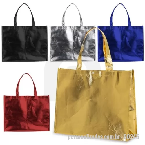 Sacola de TNT metalizado personalizada - Descrição: Sacola TNT metalizada 110g/m² com botão. Confeccionado em TNT com revestimento plástico laminado, parte superior possui botão plástico para fecho.  Altura :  35 cm  Largura :  45,5 cm  Profundidade :  11,5 cm