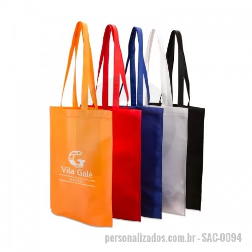 Sacola de TNT personalizada - Sacola colorida com alça em material TNT, possui símbolo ecológico/reciclável na costura da alça. Tamanho de 41,2cm x 37,2cm.
