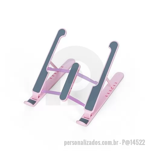Suporte Laptop personalizado - Suporte retrátil para notebook com ângulos reguláveis. Com “esteiras” de silicone antideslizantes, o suporte contém seis posições para regulagem que se adaptam conforme a necessidade do usuário, promovendo um maior conforto e aperfeiçoando a ergonomia durante sua utilização. Sua estrutura de corte aberto torna a circulação de ar excepcional, acelerando o resfriamento do notebook e proporcionando uma dissipação de calor ideal ao eletrônico.