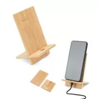 Suporte para celular em bambu, desmontável em duas partes. Contém um orifício que lhe permite carregar o seu celular enquanto utiliza o suporte. Fornecido em caixa presente de papel kraft reciclado.